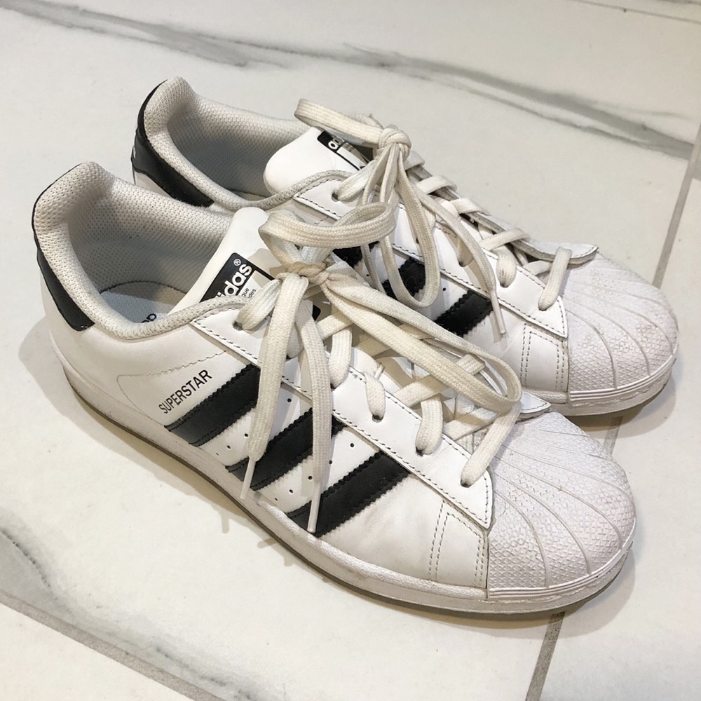 ADIDAS white core and black stripes shoes